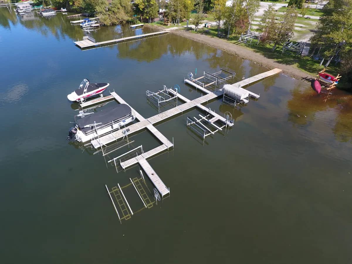 Aerial view of a dock and lift system with several boats